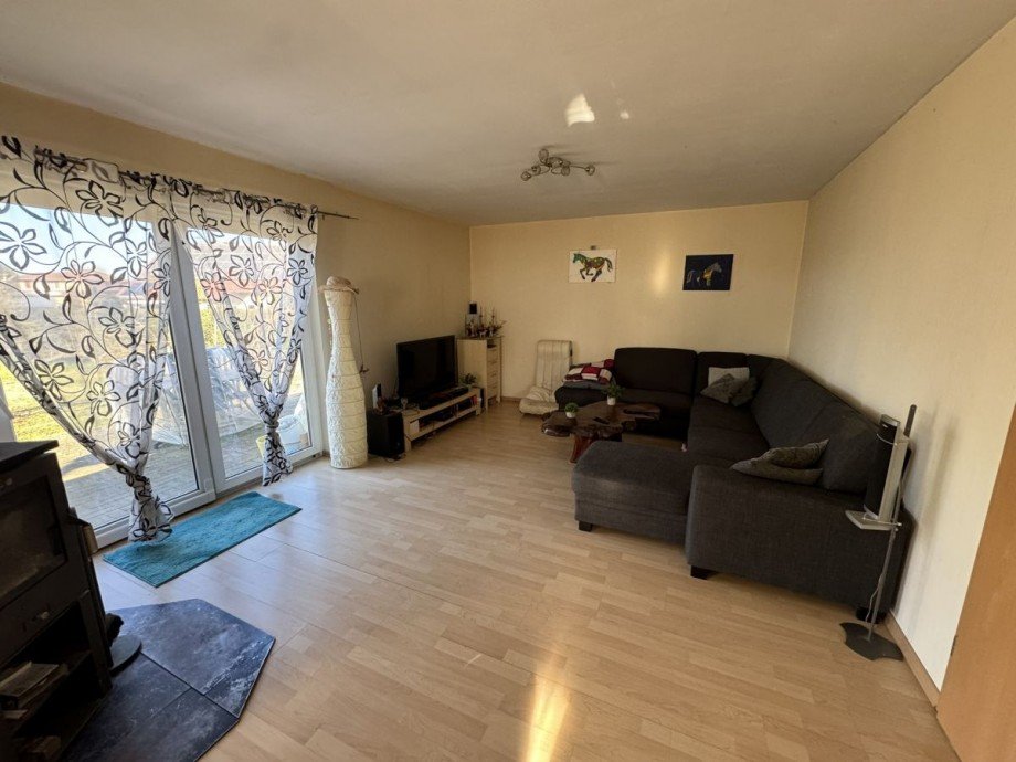 Wohnzimmer mit Kaminofen Einfamilienhaus Leimersheim